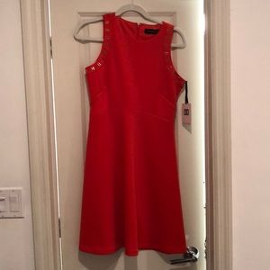 Ivanka Trump dress in orange/peach.